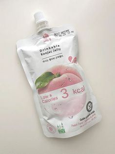 a package of pinkish konjac jelly on a white surface