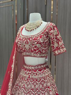 This elegant Radiant Bridal Lehenga BL-009 is crafted with intricate details and luxurious materials. Perfect for any bride looking to radiate beauty and style on her special day. Featuring stunning embroidery and a flattering silhouette, this lehenga is the perfect choice for any traditional wedding. Fabric: Raw Silk! WASH CARE INSTRUCTIONS - Please Dry clean only when it is applicable! Ready to Ship! Traditional Fitted Wedding Dress With Drape, Traditional Fitted Wedding Dress With Pallu, Fitted Wedding Dress For Traditional Ceremonies, Fitted Wedding Dress For Traditional Ceremonies And Festive Season, Fitted Wedding Dress For Festive Season, Festive Fitted Wedding Dress For Traditional Ceremonies, Traditional Fitted Wedding Dress For Festive Occasion, Traditional Festive Wedding Dress, Traditional Wedding Dress With Zari Work For Ceremonies