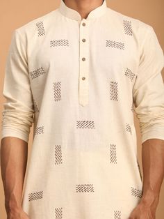 SHVAAS By VASTRAMAY Men's Cream Katha Stich Embroidered cotton Kurta With Cream Pant Set This elegant cream-colored kurta and pant set by SHVAAS By VASTRAMAY is crafted with meticulous Katha stitch embroidery. Made from high-quality cotton, it ensures comfort and style, perfect for festive occasions or casual gatherings. Features Traditional Katha stitch embroidery Comfortable and breathable cotton fabric Elegant cream color Includes matching cream pants Specifications Brand: SHVAAS By VASTRAMAY Transitional Off-white Cotton Set, White Cotton Traditional Wear With Block Print, Cotton Traditional Wear With Resham Embroidery, Traditional Block Print Cotton Kurta, Off White Cotton Traditional Wear For Festivals, Long Sleeve Cotton Traditional Wear With Block Print, Handloom Cotton Long Sleeve Sets, Long Sleeve Beige Kurta For Festivals, White Long Sleeve Handloom Traditional Wear