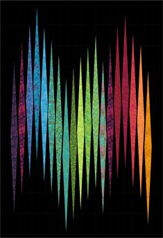 an image of colorful lines that are on a black background with the colors in it