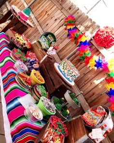 mexican food is laid out and ready to be eaten at the table for people to eat