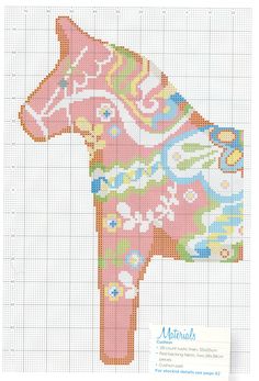 a cross stitch pattern of a pink dog