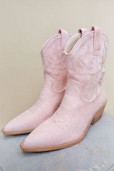 Introducing our Claire Silver Boots in Pink, a stylish and versatile addition to your footwear collection! Crafted with premium leather and boasting a matte pink finish, these boots are sure to make a statement wherever you go. The pull-on closure ensures easy wear, while the height offers both support and style. - Runs True to Size - Leather Stacked Heel - Pull straps on both sides - Color: Pink Cowgirl Couture, Silver Boots, Wedge Heel Boots, Matte Pink, Footwear Collection, Plus Size Shopping, Kendra Scott Jewelry, Couture Collection, Stacked Heel