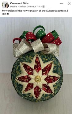 an ornament with bows on top of it