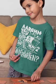 Themed Cotton T-shirt With Letter Print, Themed Cotton Crew Neck T-shirt, Themed Green Cotton Tops, Green Themed Cotton Tops, Themed Green Short Sleeve T-shirt, Green Themed T-shirt With Short Sleeve, Green Themed Short Sleeve T-shirt, Themed Green Crew Neck Top, Green Themed Crew Neck Top