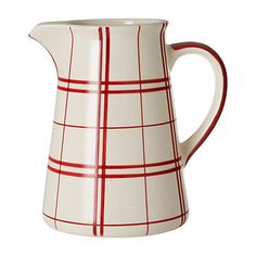 a white and red pitcher with lines on it's sides, sitting in front of a white background