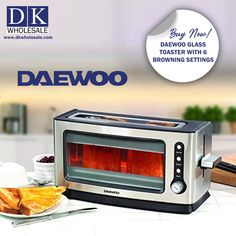 a silver toaster oven sitting on top of a counter next to a plate of food