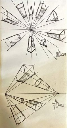 some drawings that are on top of a piece of paper with lines and shapes in the middle