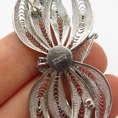 925 Sterling Silver Vintage Stanco Filigree Design Pin Brooch Weight: 7.0g WELCOME TO PAWN SHOP We are an actual pawn shop and have been in business for over 25 years. Since 1990, our establishment has been serving a variety of clients by providing them with short term cash solutions and options of liquidity regarding their treasured heirlooms. Acknowledging that today′s customers are very sophisticated and are looking for a variety of investments, our acquisitions are hand-picked for our specia Vintage White Gold Brooch With Intricate Design, Ornate Silver Engraved Brooches, Silver Engraved Brooches For Formal Occasions, Classic Silver Filigree Brooches, Classic Engraved Silver Brooches, Classic Silver Engraved Brooches, Classic Filigree Brooches As Gifts, Classic Silver Brooches With Intricate Design, Vintage Filigree Brooches For Anniversary