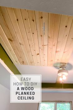 a ceiling fan with the words easy how to diy a wood planked ceiling