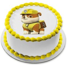 a birthday cake with a cartoon dog on it