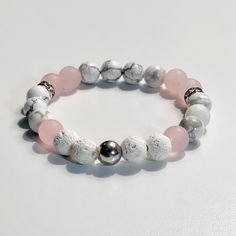 Essential Oil Aromatherapy Diffuser Beaded Bracelet. Made Semi-Precious Gemstones With White Howlite, White Lava Stone, Rose Quartz, Silver Hematite, Silver Spacers. Perfect For Any Occasion, Dressy Or Casual. You Can Also Mix And Match Several To Wear Together. ***Essential Oils Not Included*** Handmade White Rose Quartz Bracelet, White Rose Quartz Beaded Bracelets As Gift, White Rose Quartz Beaded Bracelet As Gift, White Casual Bracelet For Meditation, Casual White Stretch Bracelet With Natural Stones, Casual White Bracelet For Meditation, Adjustable White Rose Quartz Beaded Bracelets, White Rose Quartz Beaded Bracelets For Healing, White Rose Quartz Healing Beaded Bracelets