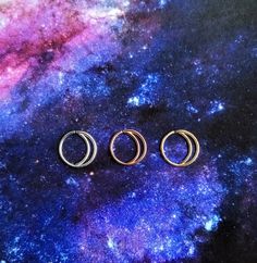 To purchase, select material (sterling silver, 14k rose gold fill, or 14k gold fill) and size (10mm, 9mm, or 8mm) then click add to cart. 🌙⭐ ♥ To save for later, click the heart at the top of the image ♥ Please choose MATERIAL: ★ 100% 14K Gold Filled ★ ★ 100% 925 Sterling Silver ★ ★ 100% 14K Rose Gold Filled ★ ♥ Can't decide on what color you would like? Get a THREE PACK of hoops in the dropdown menu for a discounted price! 🎁❄️🎄GIFT WRAPPING AVAILABLE AT CHECKOUT ️ For more of my designs look Moon Nose Ring, Boho Nose Ring, Rose Gold Septum Ring, Rose Gold Nose Ring, Double Nose Ring, Conch Piercings, Nose Ring Hoop, Septum Hoop, Small Nose