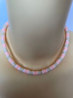 "A Heshi Vinyl Choker Necklace in colours of Peach, Cream and White, it has a silver plated lobster claw clasp and the length is adjustable up to 2\" more with a silver plated extender chain. Approx Length 14 1/2 \" (36.8cm) Extender Chain 2\" (5cm) Presented in a Gift Bag A344 DELIVERY This item will be sent Free delivery UK ONLY via Royal Mail 1st class Standard. Estimated Delivery Next Day after item has been dispatched.                                                For Royal Mail Internatio Peach Necklace Gift, Peach Round Necklace For Gift, Peach Round Necklace Gift, Round Peach Necklace For Gift, Gift Round Peach Necklace, Adjustable Round Orange Necklace, Adjustable Coral Necklace With Lobster Clasp, Summer Jewellery, Peach Cream