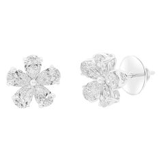 18Kt White Gold Diamond Flower Earrings Featuring 6.05cts or 12 GIA certified pear shape matching diamonds. D-G in color and VS clarity. Flower Diamond Earrings, Gold Earring Studs, Antique Diamond Earrings, Diamond Flower Earrings, Yellow Gold Diamond Earrings, Diamond Huggie Earrings, Diamond Cluster Earrings, Expensive Jewelry Luxury, White Gold Earrings Studs