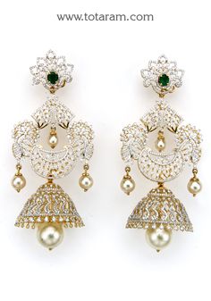 18 karat gold '4 in 1' detachable diamond jhumkas - diamond dangle earrings with color stones & pearls
  this product has inter changeable stones in the earrings
  width of the jhumka : 1.00 inches
  

introducing our exquisite 18 karat gold '4 in 1' detachable diamond jhumkas, a stunning pair of diamond dangle earrings that exudes elegance and luxury. handcrafted with precision and attention to detail, these earrings are made in india by totaram jewelers, a trusted name in the industry.
  
  th Bollywood Diamond Gold Jhumkas, Bollywood Gold Diamond Jhumkas, Bollywood Style Diamond Gold Jhumkas, Bollywood Style Gold Diamond Jhumkas, Diamond Gold Jhumkas For Reception, Gold Diamond Jhumkas For Reception, Gold Diamond Bridal Earrings With Latkans, Gold Bridal Earrings With Diamond Latkans, Gold Diamond Fusion Jhumkas