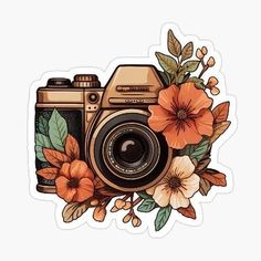 an old fashioned camera with flowers and leaves on the side sticker is sitting in front of a white background