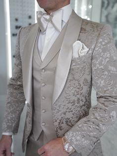 Everyone's favorite fabric of the year! Showcasing our latest Champagne Oro Fiore look 🤩 What do you think about this one 😮 #sebastiancruzcouture #eventready #lookoftheday Wedding Blazer With Button Closure And Suit Collar, Elegant Semi-formal Blazer With Covered Buttons, Elegant Beige Three-piece Suit, Single Breasted Long-sleeved Three-piece Suit For Wedding, Long Sleeve Wedding Tuxedo With Button Closure, Wedding Suits With Lapel Collar And Buttons, Fitted Wedding Blazer With Button Closure, Elegant Beige Three-piece Suit With Long Sleeves, Luxury Wedding Outerwear With Buttons