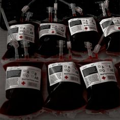 several bags of blood sitting on top of a table