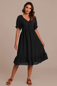 Black Textured Short Sleeve V Neck Ruffle Midi Dress Chic Empire Waist Dress With Ruffles, Elegant V-neck Dress With Smocked Bodice, Sweetheart Neckline Dress With Ruffle Hem For Garden Party, Summer Midi Dress With Ruffle Hem And Sweetheart Neckline, Sweetheart Neckline Midi Dress With Ruffles For Date Night, Flowy Dress With Smocked Bodice And Sweetheart Neckline, Flowy Ruffled Dress With Sweetheart Neckline, Elegant Midi Dress With Ruffle Hem And Sweetheart Neckline, Solid Puff Sleeve Dress With Ruffle Hem