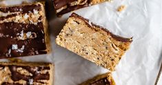 chocolate and oatmeal bars on top of parchment paper