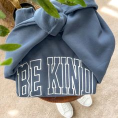 Feeling the world needs a little extra dose of kindness? You're not wrong! Share the love (and maybe some cozy comfy vibes) with this super cozy sweatshirt embroidered with a warm and fuzzy "BE KIND" message. It's a gentle reminder to ourselves and a sweet message to the world, all wrapped up in pure comfort. Perfect for spreading kindness wherever you go, or simply cuddling up with a warm drink and a kind heart. Features: Popular Comfort Colors® Brand ☁️ Soft and cozy fleece sweatshirt material 🧵 Simple satin style embroidery font 🌈 Available in a variety of sweatshirt and thread colors 🌈 Full garment dyeing process gives these sweatshirts unique vintage character and are not always the same. Made with ultra soft cotton/polyester blend fleece, these garments are as comfortable as they Trendy Letter Embroidery Sweatshirt For Loungewear, Embroidered Text Sweatshirt For Loungewear, Trendy Oversized Sweatshirt With Letter Embroidery, Loungewear Sweatshirt With Embroidered Text, Trendy Oversized Sweatshirt With Embroidered Text, Cozy Cotton Sweatshirt With Embroidered Text, Embroidered Text Sweatshirt For Fall, Fall Sweatshirt With Embroidered Text, Winter Letter Embroidery Sweatshirt For Loungewear