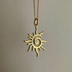 Spiral Sun Necklace, Little Sun Charm, 925 Sterling Silver Minimal Glowing Sun Pendant, Hippie Jewelry, Celestial Necklace, Gift for Her Little Sun Charm is going to brighten your day while completing your outfit ☀️ Product Details, - Carefully produced with High Quality 925k Sterling Silver - 14k Gold Plated - Height of the pendant: 2.2 cm (0.83 inches) - Chain Length is optional; 45 cm or 55 cm, and also you can order the pendant with no chain - Unique and delicate design ✈️✈️✈️ EXPRESS & FREE Sun Themed Clothes, Spiral Brass Necklace For Gift, Swirl Shaped Sterling Silver Jewelry In Gold Color, Yellow Gold Swirl Jewelry Gift, Swirl Shaped Yellow Gold Jewelry Gift, Hand Forged Spiral Jewelry Gift, Symbolic Spiral Sterling Silver Jewelry, Symbolic Sun Design Jewelry For Gifts, Handmade Swirl Necklace For Gift