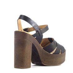 Designed in luxe leather with a dramatic platform and chunky heel, Chelsea Crew's HOLLIE sandals deliver maximum impact to any ensemble. Wear them to balance the season's fluid hemlines and cropped pants. Upper: leather Closure: buckle Heel height: 4.5" Platform height: 2.5" Modern Chunky Platform Leather Heels, Modern Leather Heels With Chunky Platform, Summer Leather Block Heels With Chunky Platform, Leather Chunky Platform Wedge Heels, Leather Block Heels With Chunky Platform For Summer, Chic Chunky Platform Leather Heels, Chic Leather Chunky Platform Heels, Leather Block Heels With Reinforced Heel For Spring, Chunky Platform Wedge Heels