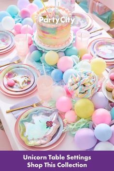 a table topped with lots of plates and cake