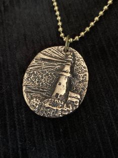 "Lighthouse Pendant Necklace!  An Original Designed Unique Pendant! Size is 1-1/8\" wide by 1-3/8\" tall  Pendant Cast in Solid Bronze 24\" Ball Chain Necklace Price includes USPS First Class Shipping Hand Made in the USA! If you need a gift box or priority mail shipping, please contact us for an upgrade." Adjustable Nickel Free Dog Tag Necklace, Personalized Bronze Metal Jewelry, Stamped Pendant Necklaces For Jewelry Making, Bronze Round Pendant Charm Necklace As Gift, Bronze Jewelry With Lobster Clasp For Gift, Nickel-free Dog Tag Necklace Gift, Nickel-free Dog Tag Necklace For Gift, Personalized Bronze Pendant Jewelry, Personalized Bronze Pendant Necklace