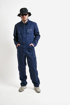 "Vintage men's cotton coverall boilersuit in navy blue colour. Size - L (50 on the label). Model is 187 cm / 6ft 1.6\" tall and usually wears size L. Very good condition. All orders are shipped every day Worldwide from EU. Safe registered standard delivery Worldwide with courier and tracking number. You can also choose super fast 1-4 days Express delivery. Just choose shipping upgrade in your cart. Don't forget to write your number. It will be used only for delivery. SHIPPING TIME & COST Here yo Dickies Coverall, Coverall Men, Coveralls Mens, Work Coveralls, Overalls Men, Mens Overalls, Vintage Jumpsuit, Navy Blue Long Sleeve, Retro 60s