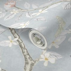 an image of a wallpaper with flowers and leaves on the background in pastel blue