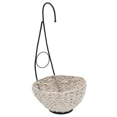 a basket hanging from a hook on a white background