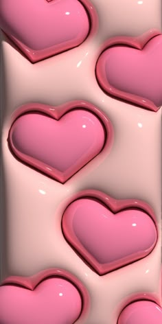 pink hearts are arranged in the shape of heart shapes on a white and pink background