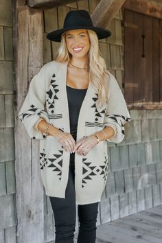 This Cream and Black Aztec Print Cardigan is a cozy yet stylish piece perfect for fall and winter! Features an Aztec print in classic cream and black tones. Free US shipping! Sweater Cape, Geometric Cardigan, Aztec Print Cardigan, Revival Clothing, Fall Style Guide, Gameday Dress, Casual White Dress, Game Dresses, Cardigan Sweater Jacket