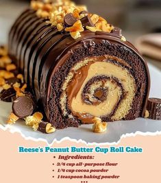 there is a roll cake with chocolate and nuts on it