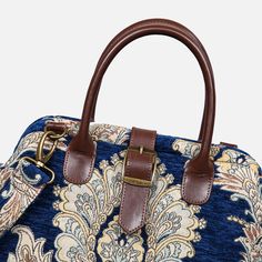 With a nod to the Victorian era, MCW’s freshly combines the classic and elegant design of the traditional carpet bag with a textural and tactile twist.The main body of purse-sized bags is made with thick chenille carpets. The handles and belts are genuine leather with heavy cotton canvas lining. Six bronze stands at the bottom allow the bag to stand stably. Every bag comes with a detachable and adjustable shoulder strap (55 inches) made from the same chenille as the bag and fixed with high-quali Elegant Tapestry Bags For Everyday Use, Elegant Tapestry Shoulder Bag With Leather Handles, Elegant Tapestry Bag With Leather Handles, Elegant Tapestry Bag For Daily Use, Daily Use Tapestry Bags With Adjustable Strap, Rectangular Weekender Bag With Adjustable Handle, Tapestry Satchel Bag With Adjustable Handle, Top Handle Tapestry Bag With Adjustable Strap, Elegant Tapestry Satchel With Detachable Strap