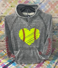 a gray hoodie with a baseball heart on it