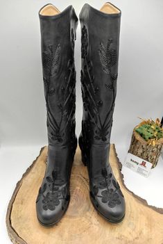 This is genuine leather custom made black suzani boots. There is every size available 6 us to 11 us 36 us to 42 us. Heel is 2 inch 5 cm. Suzani boots made with genuine leather, ykk zipper, steel sole, ortapedic sole. Useful and water proof, under the rain, sunshine, snow, wearable. Confortable and light. There is zipper on back side easy to use. On boots black color used. Knee size boots wearable on work, walking, driving, festival, school, outdoor etc... Possible to make wider calf. Please let Embroidery Boots, Under The Rain, Wide Calf, Black Leather Boots, Winter Boot, Knee High, Leather Boots, Custom Made, Black Boots