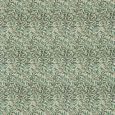 a green and white wallpaper with leaves on it