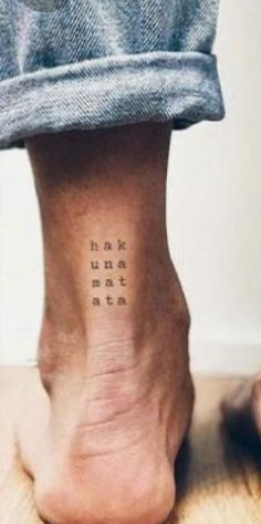 a person with a small tattoo on their foot