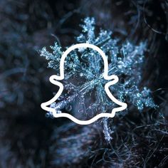 a snapchat logo is seen on a snowflake in this undated image