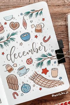 an open notebook with the words december written on it