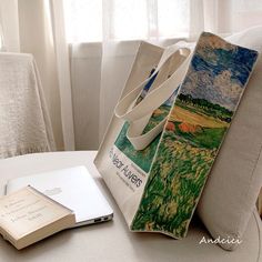 A tote bag depicting Van Gogh's "Plains near Auvers".






 <Size>



 Height: 36cm

 Width: 36cm

 Gusset: 10cm






 <Material>



 thick canvas fabric Artistic Rectangular Canvas Bag, Artistic Large Capacity Rectangular Canvas Bag, Artistic Canvas Shopping Bag, Artistic Canvas Shoulder Bag With Large Capacity, Artistic Large Capacity Canvas Bag, Artsy Canvas Tote Bag, Artistic Canvas Gift Bag, Sleepover Things To Do, Design Bag