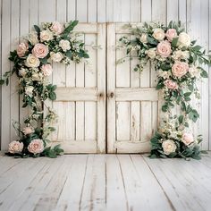 an old door decorated with flowers and greenery for a rustic wedding ceremony or reception