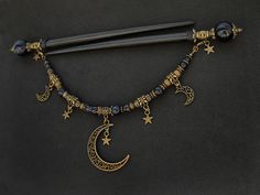 "Set of two beautiful hair sticks with blue goldstone (know also as sandstone / stellaria / night of Kairo) round beads in various sizes. Along with two hair sticks, there is a beautiful, long REMOVABLE pendant / chain - which gives you more possibilities to create beautiful up-do. Chain is decorated with moons and stars. If you're not currently into connected hair sticks, you can simply take off the pendant. * Total length: 17,6cm / 6,9\" * Usable length: 13,5cm / 5,3\" * Pendant length: 19,5cm Wooden Hair Sticks, Japanese Kanzashi, Pelo Anime, Chopstick Hair, Moons And Stars, Witch Diy, Witchy Jewelry, Blue Goldstone, Fantasy Story