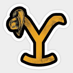 the letter y with a snake wrapped around it's head in yellow and black