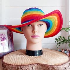 This lovely Rainbow crochet sun hat is handmade and has a malleable wire that has been woven into the rim to help keep the shape. The hat is wide brimmed and provides protection from the sun, so perfect for any summer outdoor activity. Crown size approx. 15cm - Brim size approx. 11cm Daisy hat band is sold separately. Adjustable Multicolor Crochet Straw Hat, Adjustable Multicolor Straw Crochet Hat, Multicolor Brimmed Straw Crochet Hat, Multicolor Woven Summer Crochet Hat, Summer Multicolor Woven Crochet Hat, Multicolor Straw Crochet Hat With Wide Brim, Multicolor Wide Brim Crochet Straw Hat, Adjustable Rainbow Hats For Summer, Adjustable Rainbow Summer Hats