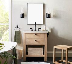 a bathroom with a sink, mirror and stool