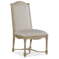 an upholstered side chair with nail polishing on the legs and backrests